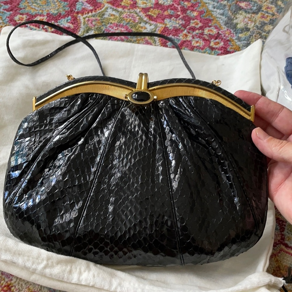 Judith leiber vintage skin clutch with strap 11” long is the bag length strap 20